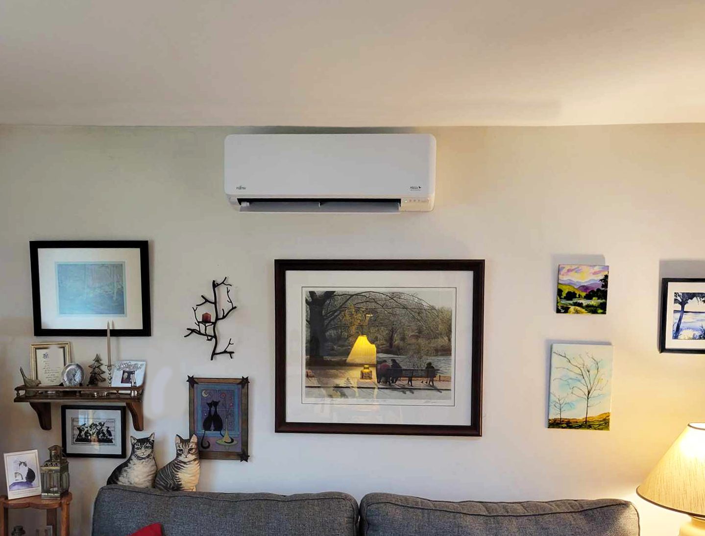 Heat pump in cozy living room setting.
